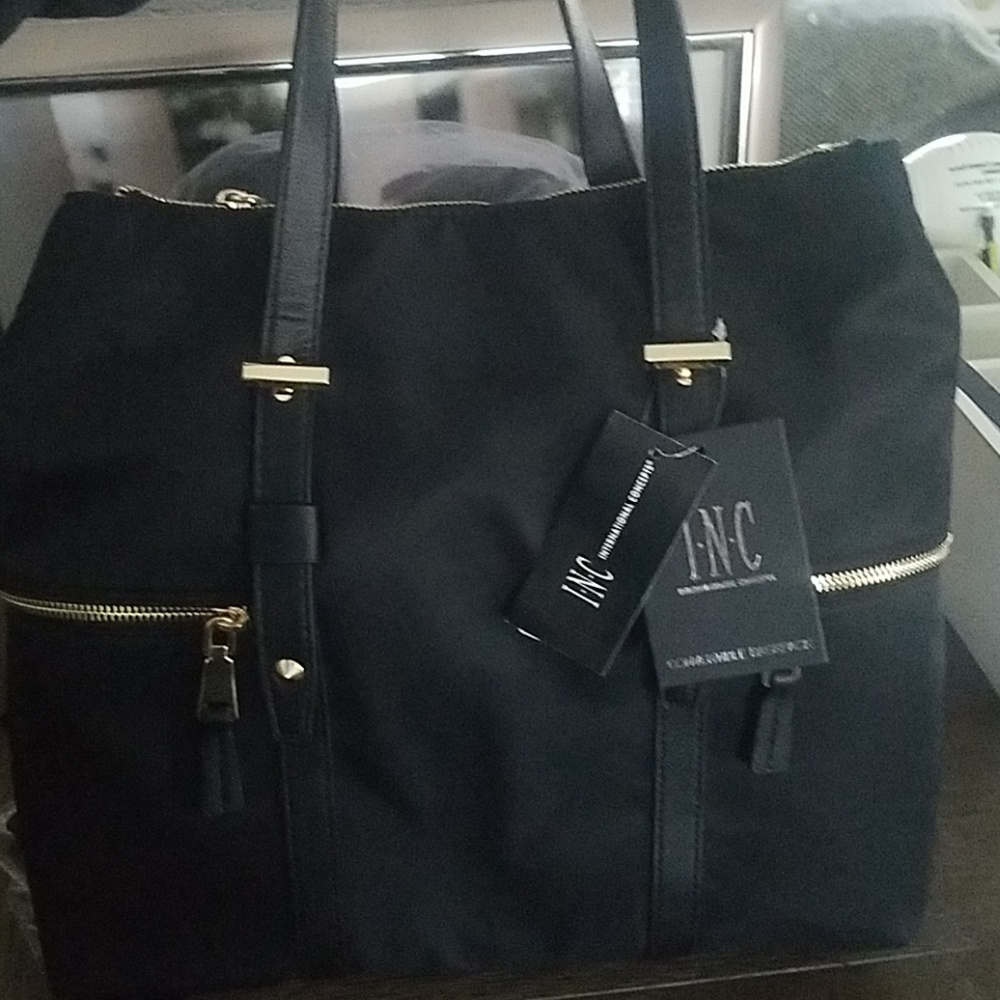 Convertible purse/backpack black and gold